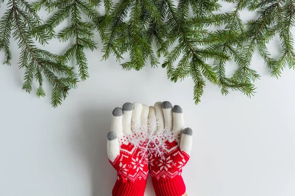 Female Hands Winter Gloves Glowing Snowflake Spruce Branches White Table — Stock Photo, Image