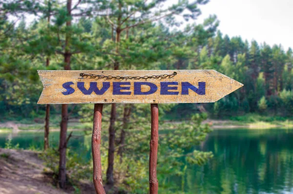 Sweden Wooden Arrow Road Sign Lake Pine Trees Background Travel — Stock Photo, Image