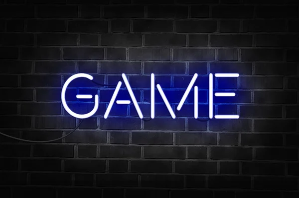 Blue Neon Sign Word Game Dark Brick Wall — Stock Photo, Image