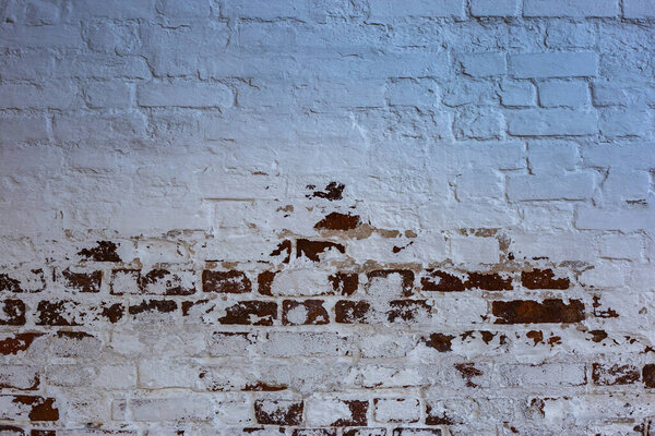 Texture of white old brick wall