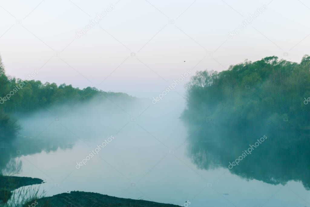 fog early in the morning over the river