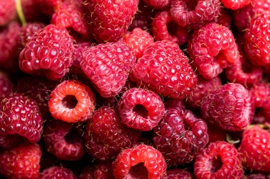 Taze ve tatlı kırmızı ahududu dokusu. meyve yığını arka planı