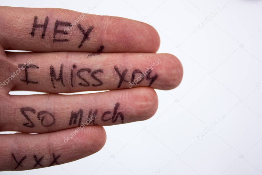 Hey, i miss you so much lettering on human hand - valentines concept