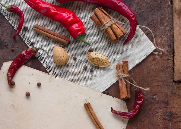 Pimientos Secos Con Almendras Granos Pimienta Canela Sobre Mesa — Foto de Stock