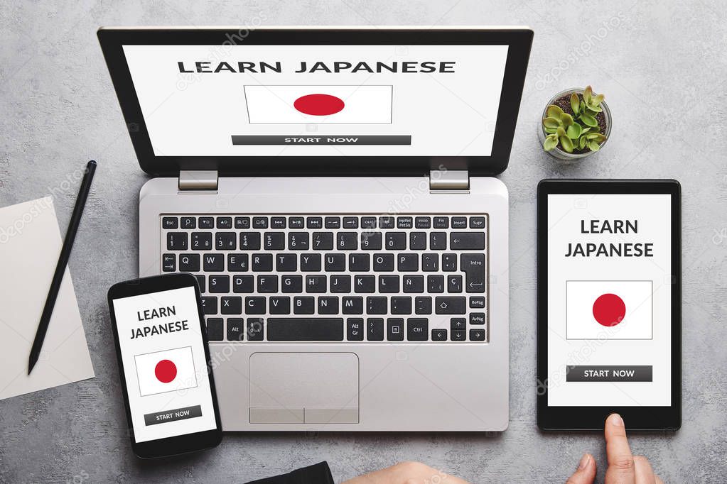 Learn Japanese concept on laptop, tablet and smartphone screen