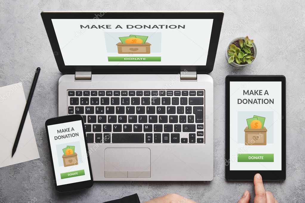 Donation concept on laptop, tablet and smartphone screen
