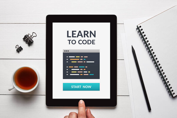 Learn to code concept on tablet screen