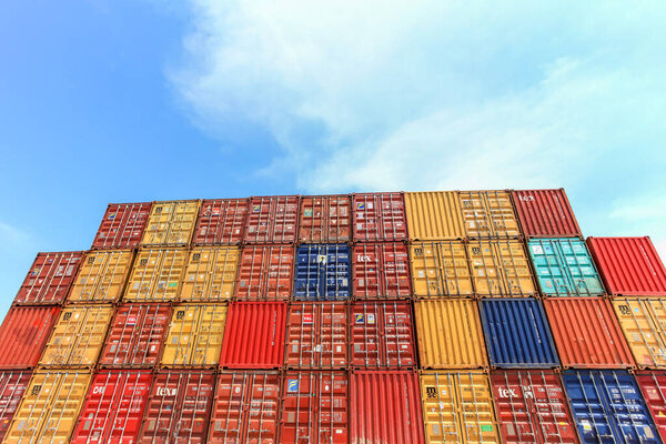 Shipping Containers stacked at a holding platform.