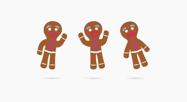 Gri arka planda farklı duygusal durumlara sahip bir adam şeklinde üç Noel kurabiyesi..