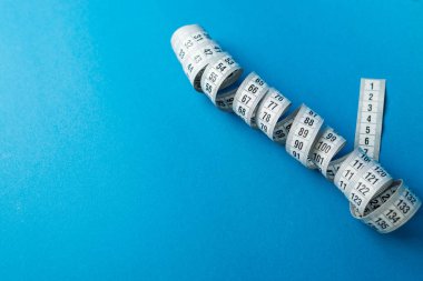 Terzi teyp arka plan üzerinde ölçüm yukarı kapatın. Alan sığ bölümü beyaz ölçme bant.