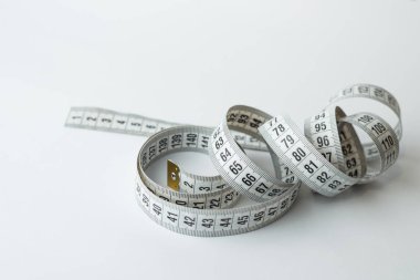 Terzi teyp arka plan üzerinde ölçüm yukarı kapatın. Alan sığ bölümü beyaz ölçme bant.