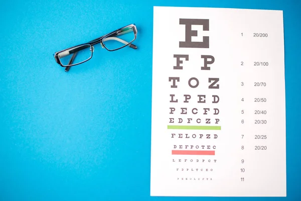 Health Care Concept Glasses Blue Table — Stock Photo, Image