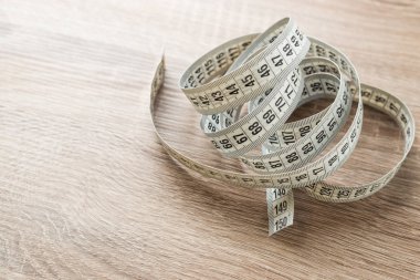 Terzi teyp arka plan üzerinde ölçüm yukarı kapatın. Alan sığ bölümü beyaz ölçme bant.