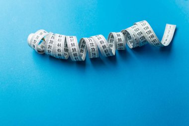 Terzi teyp arka plan üzerinde ölçüm yukarı kapatın. Alan sığ bölümü beyaz ölçme bant.