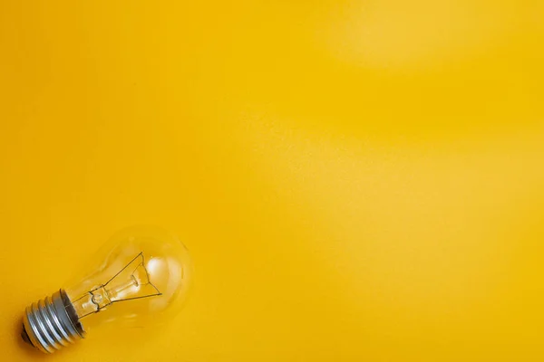 minimalistic wallpaper, light bulb and copy space