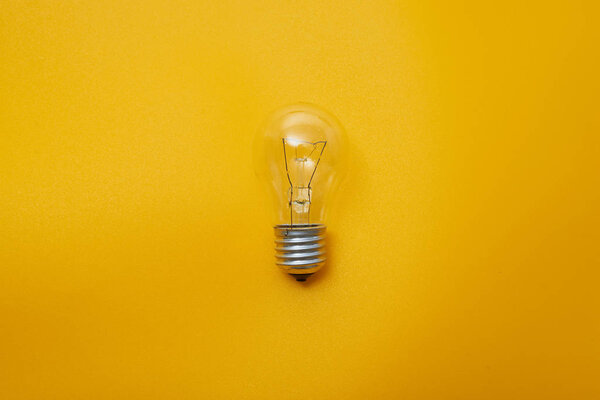 minimalistic wallpaper, light bulb and copy space