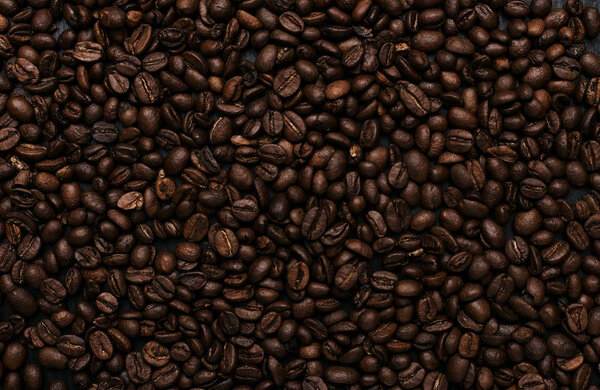 Full frame background of roasted aromatic coffee beans