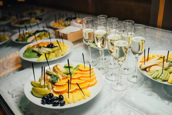 stock image close up shot of served table with fruits slices and wine 