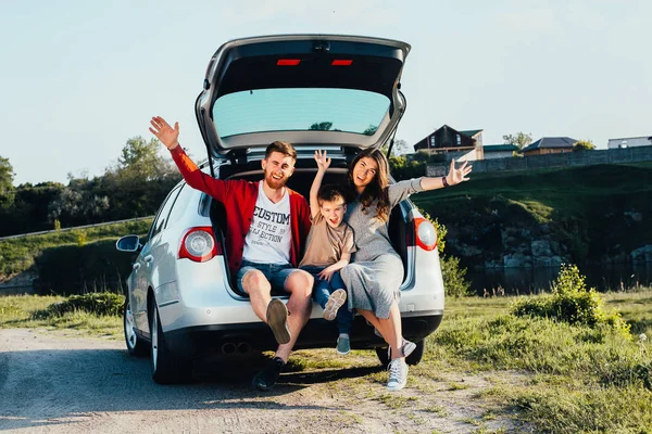 Beautiful Young Family Sitting Car Trunk Nature — Stock Photo, Image