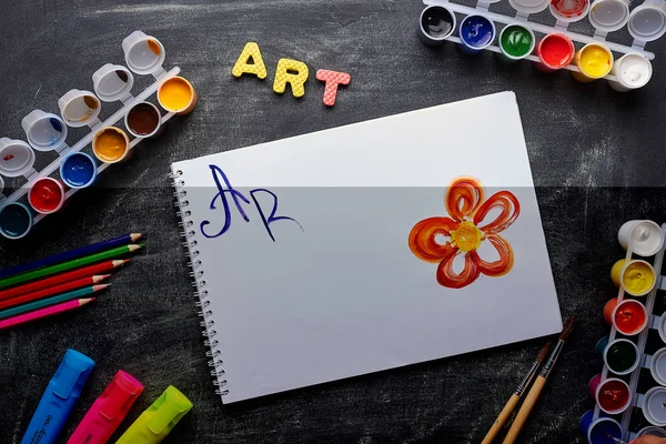 Art supplies on desk with copy space shot in studio