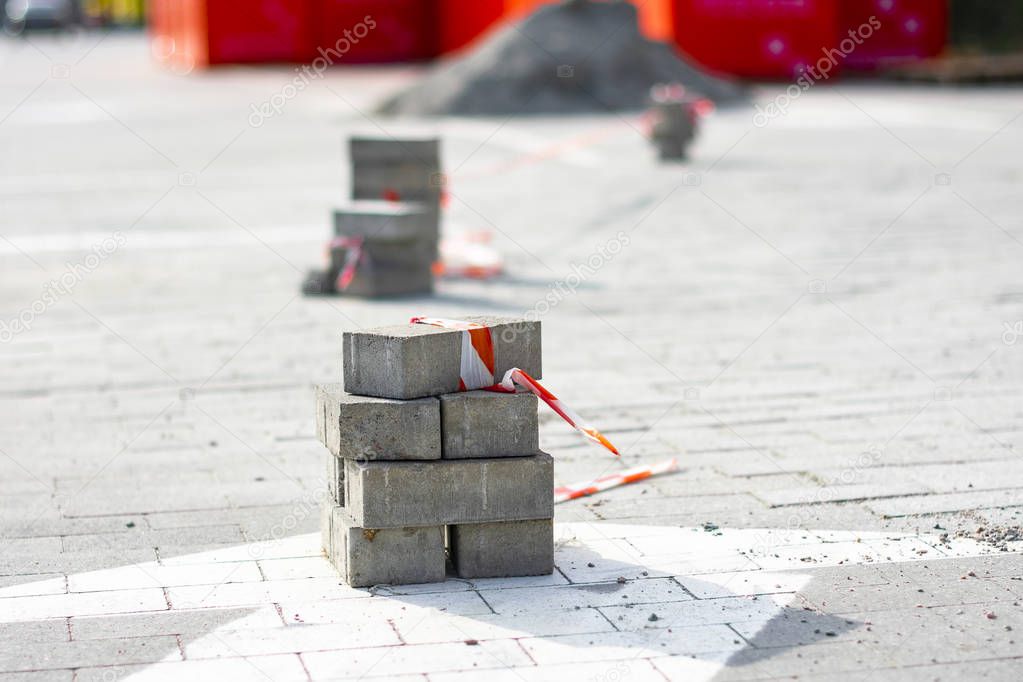 Paving slabs and tools for laying tiles