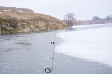 Olta, nehir arka planda dönen makara 