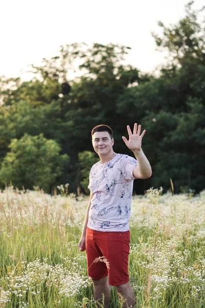 portrait of a young man in the field