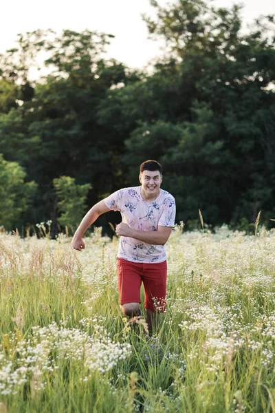 portrait of a young man in the field