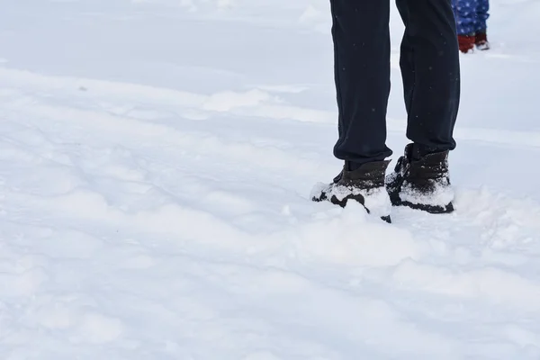 Woman Feet Snow Boots Closeup Stock Image