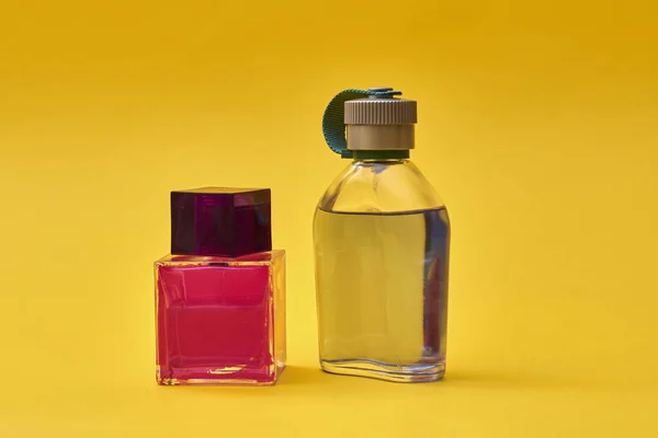 Close View Bottles Perfume Yellow Background — Stock Photo, Image