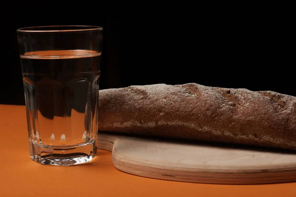 Close View Fresh Tasty Rye Bread Glass Water Orange Background — Stock Photo, Image