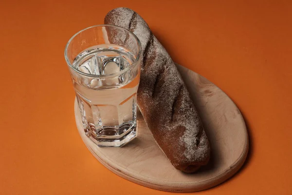 Close View Fresh Tasty Rye Bread Glass Water Orange Background — Stock Photo, Image