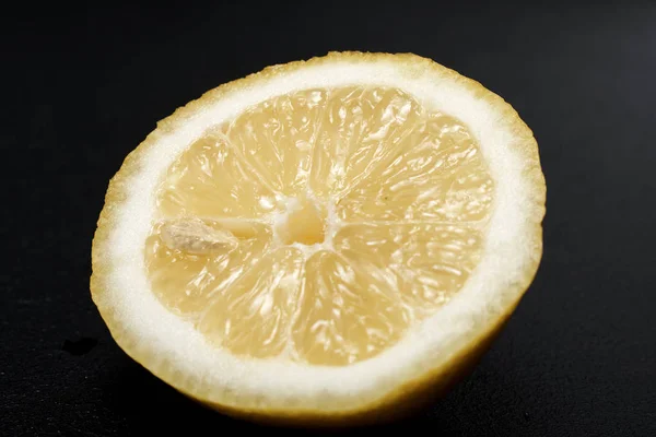 lemon slice on black background