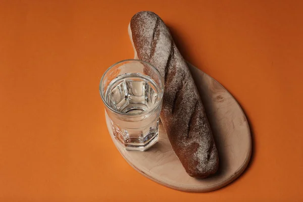 Close View Fresh Tasty Rye Bread Glass Water Orange Background — Stock Photo, Image