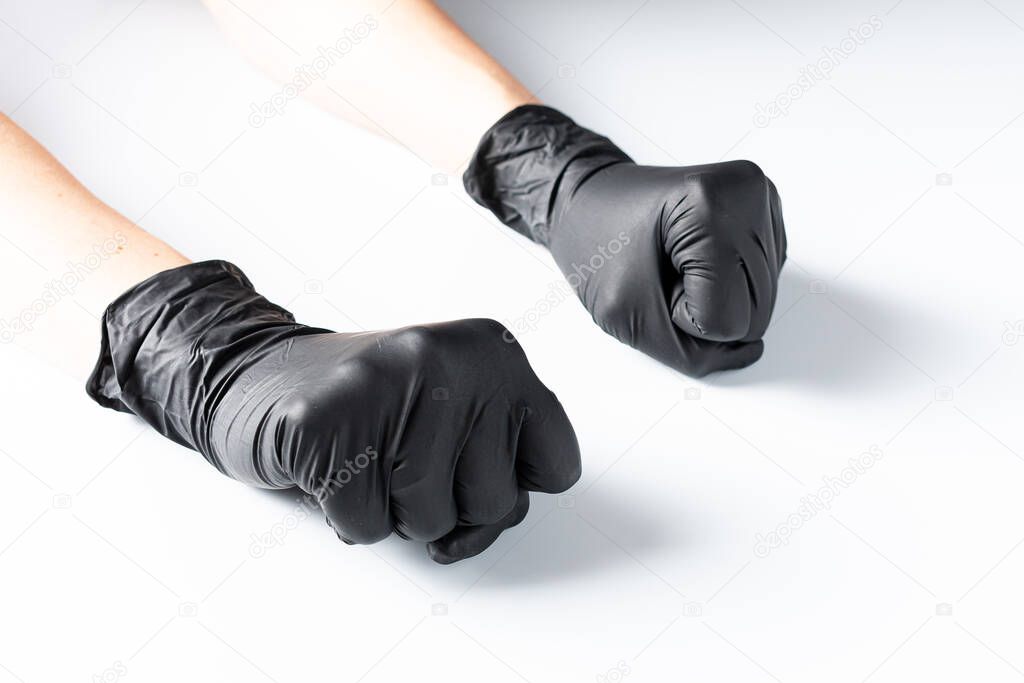 hands in protective gloves on white background  