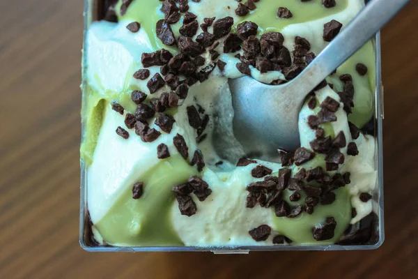 Pistachio Ice Cream Sprinkled Grated Chocolate Plastic Transparent Container Blue — Stock Photo, Image