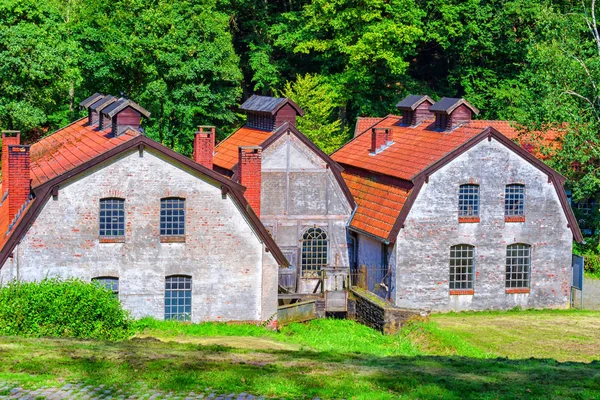 Exterior of an old factory building built from bricks