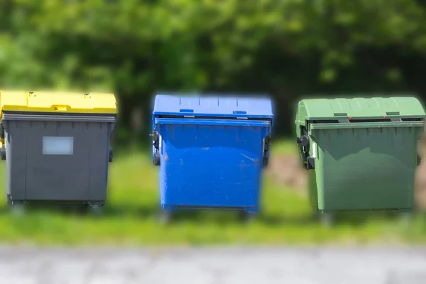 Industrial Waste Containers Dumpster for municipal and private waste or industria. Background with blur