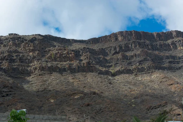 Montanhas Costa Entre Puerto Mogan Porto Rico Camadas Rocha Vulcânica — Fotografia de Stock