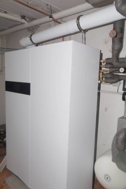 Yoğunlaştırıcı kazanı ve yakıt hücresi ısıtıcısı olan yeni gaz kazanı.