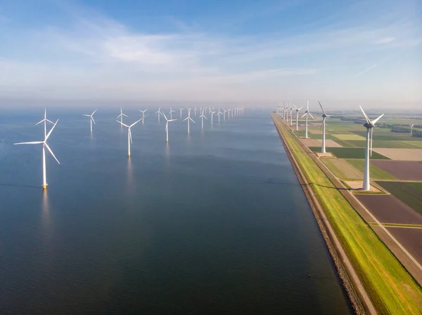 Windmill park westermeerdijk Netherlands, wind mill turbine with blue sky in ocean, green energy — Stock Photo, Image