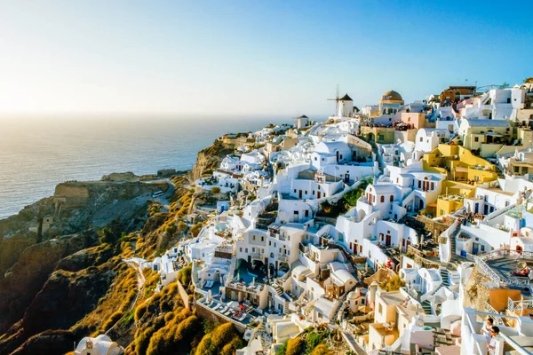 Santorini Oia Greece Europe, sunset at the white village of Oia Santorini with old blue and white Greek church at dusk — стокове фото