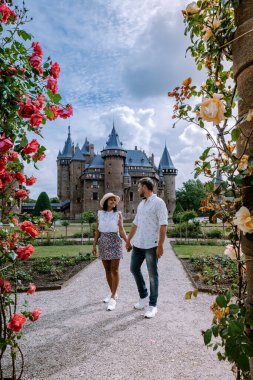 Utrecht Netherlands May 2020, medieval old castle de Haar Utrecht on a Spring day almos empty gardens during the corona virus covid 19 outbreak, most gardens and parks reopen in June clipart