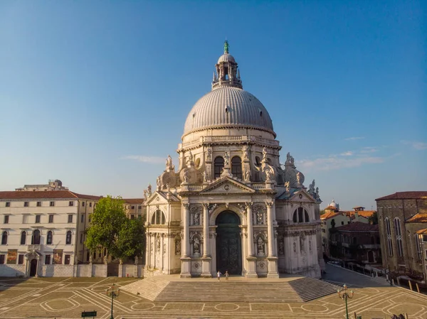 Venice from above with drone, Aerial drone photo of iconic and unique Saint Marks square or Piazza San Marco featuring Doges Palace, Basilica and Campanile, Venice, Italy