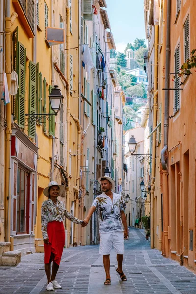 Menton France, couple men and woman on vacation at the Cote d Azur France, View on old part of Menton, Provence-Alpes-Cote dAzur, France — стоковое фото