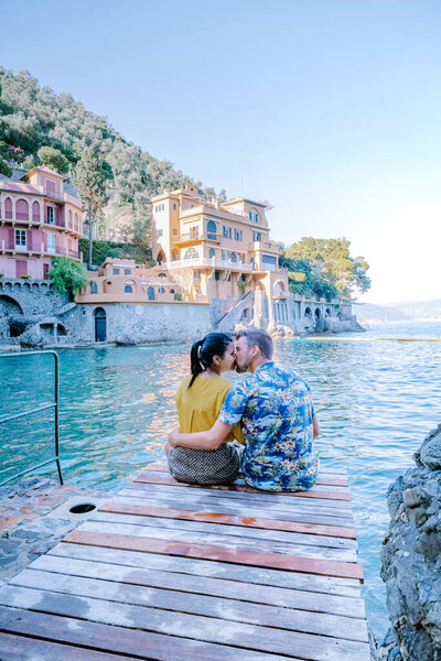 couple on vacation ligurian coast Italy, Portofino famous village bay, Italy colorful village Ligurian coast