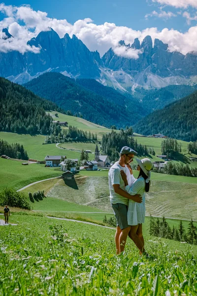 Couple on vacation Santa Magdalena Village in Dolomites area Italy, couple on vacation Val Di Funes Italian Dolomites — Stock Photo, Image