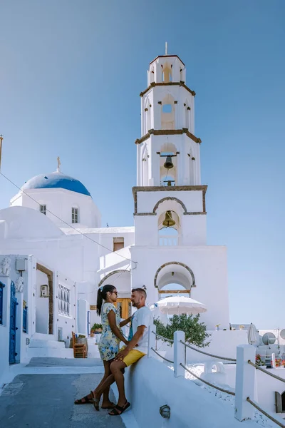 Pyrgos, Santorini, Greece. Famous attraction of white village with cobbled streets, Greek Cyclades Islands, Aegean Sea couple on vacation Santorini Greece — Stock Photo, Image
