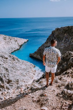 Crete Greece Seitan Limania beach with huge cliff by the blue ocean of the Island of Crete in Greece, Seitan limania beach on Crete, Greece
