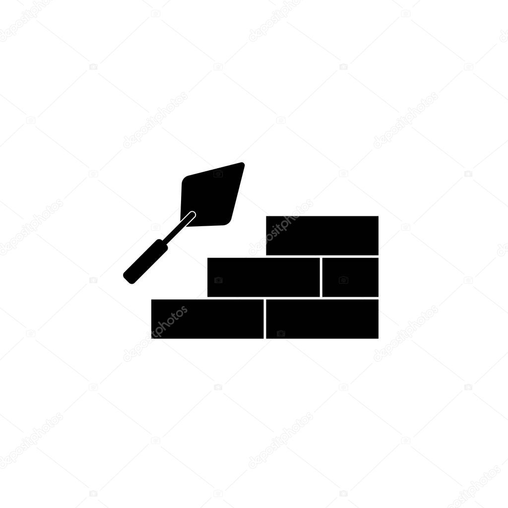 Trowel with brick wall icon